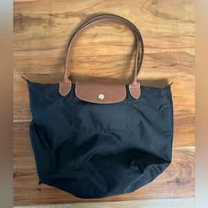 Longchamp Handbag- black nylon with brown leather handles and trim.